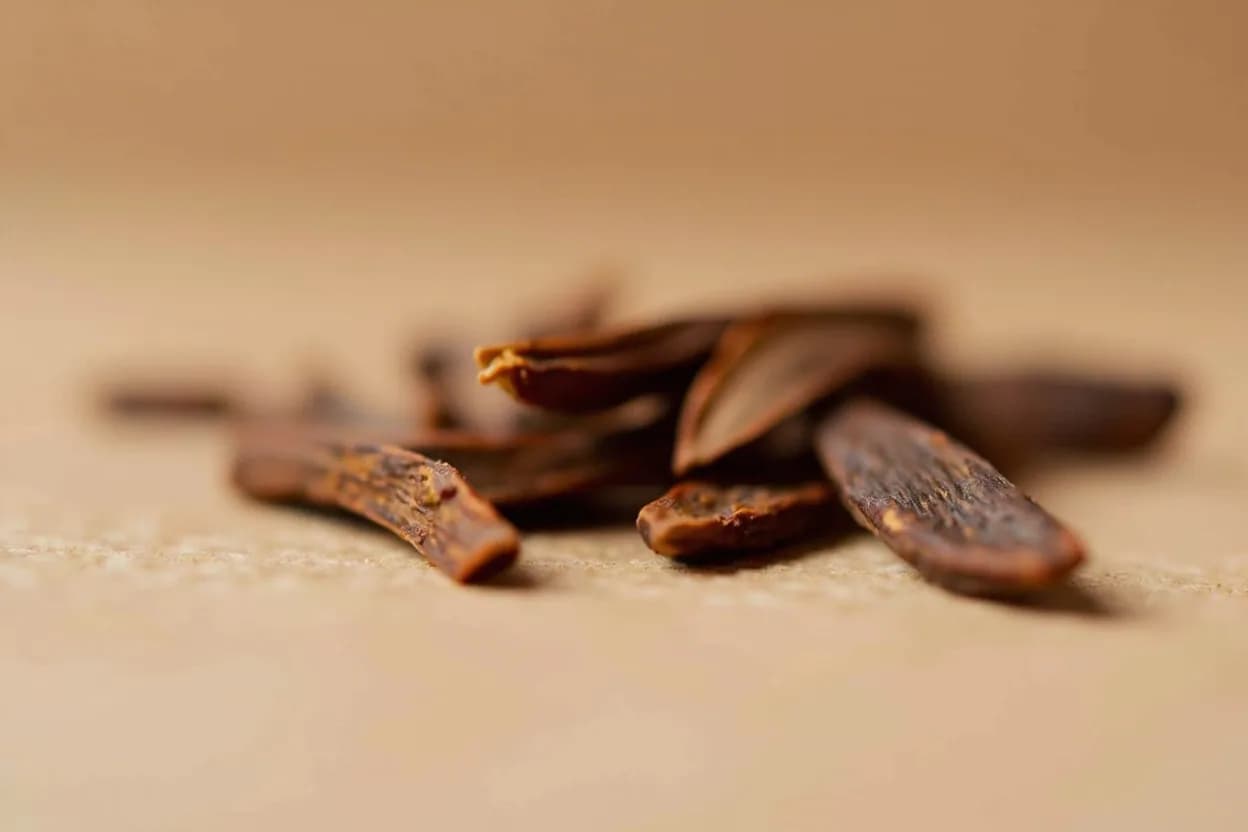 Cassia Bark in its natural form. Cassia bark is the dried inner bark of Cinnamomum cassia, a tree native to southern China. Tasting profile: bold spicy sweetness, camphor / eucalyptol undertone, woody, slightly resinous, mild astringency on the finish.
