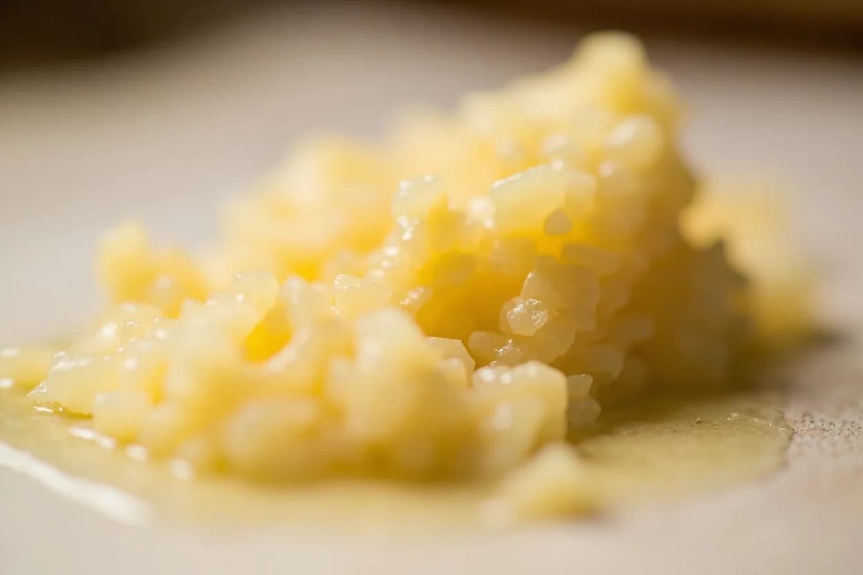 Lamb Fat (Rendered) in its natural form. Rendered lamb fat is the purified cooking fat obtained by slowly melting down lamb or mutton fat — most prized from the broad tail of the fat-tailed sheep (Ovis aries) known as alya in Arabic. Tasting profile: grassy, ovine richness (branched-chain fatty acids), gamey, slightly funky lanolin note, deep savory umami from oxidized fats, waxy, dense mouthfeel.