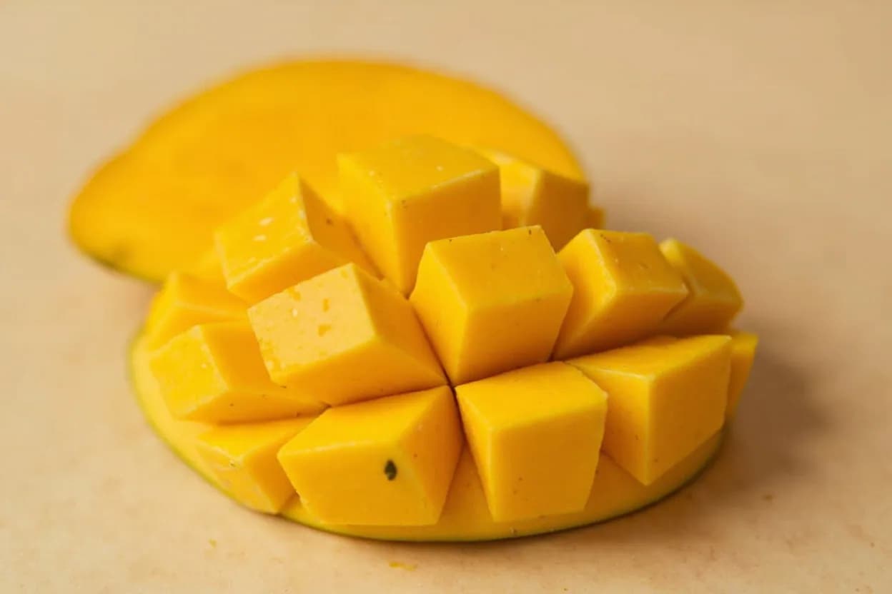 Raw Mango in its natural form. Raw mango refers to the unripe fruit of Mangifera indica harvested before sugars develop. Tasting profile: intense malic and citric acid tartness, crisp, astringent bite, faint resinous mango aroma (without sweetness), green, vegetal freshness.