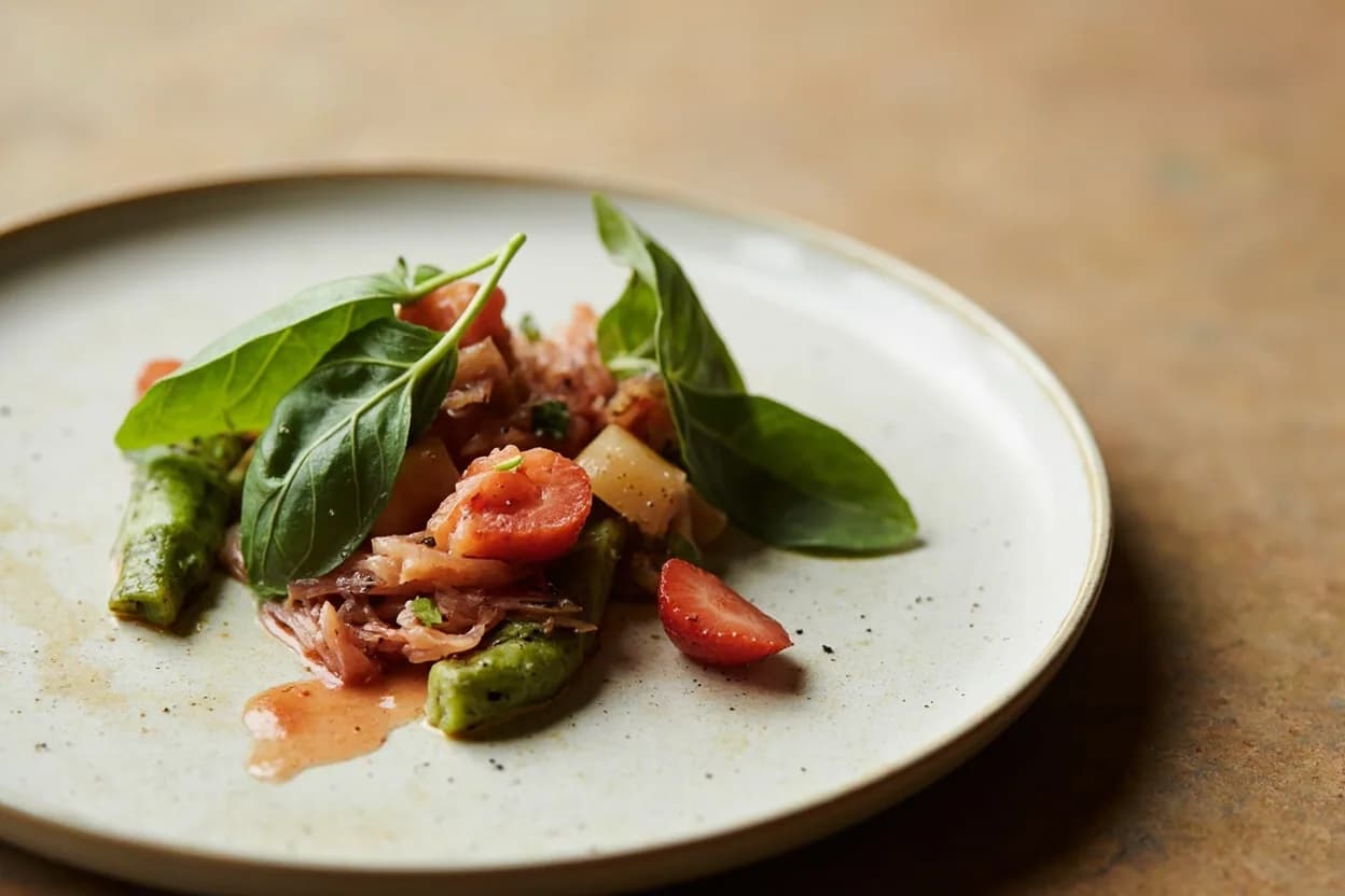 Thai Basil in its element — Pad krapow (Thai holy basil stir-fry — note: holly basil is krapow; Thai basil is horapa, often substituted). Adventurous crossover: Strawberry — Thai basil's anise-clove warmth plays extraordinarily well with ripe strawberry in cocktails, sorbets, and compotes — the combination is more complex and less cloying than strawberry-Italian basil, which has become a cl….
