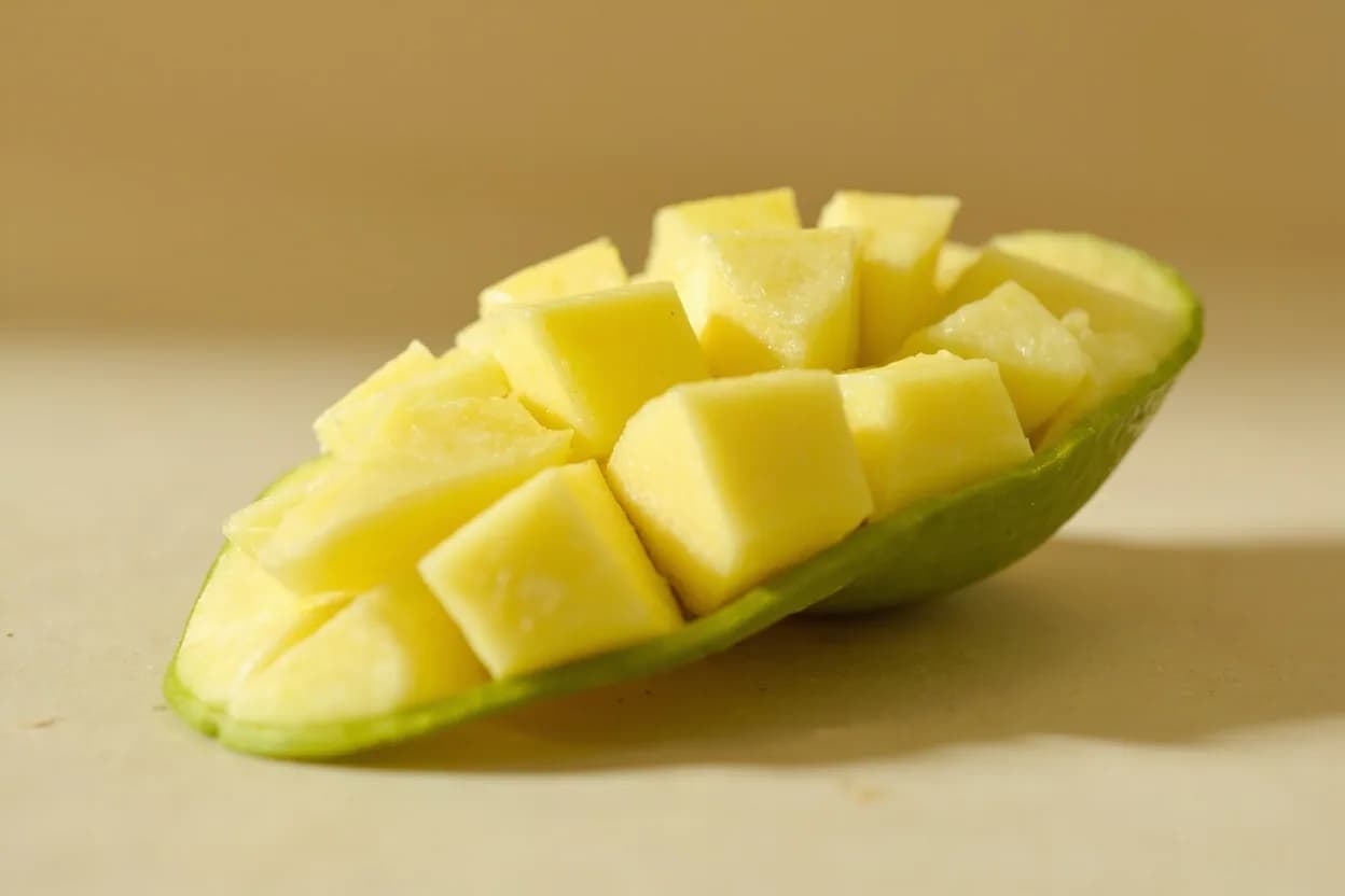 Sour Green Mango in its natural form. Sour green mango in the Thai culinary context refers specifically to unripe Nam Dok Mai or Kaew varieties harvested young for their extreme tartness and crisp, watery flesh. Tasting profile: extreme citric and malic acid tartness, sharp, clean sourness without sweetness, watery, refreshing crunch, faint aromatic resinous green note.