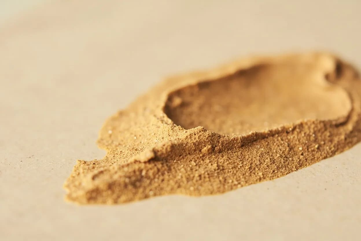 Tahini in its natural form. Tahini is a paste made from hulled (and usually lightly toasted) sesame seeds ground to a smooth, pourable consistency with a texture resembling natural peanut butter. Tasting profile: rich sesame nuttiness (sesamol and sesamin compounds), prominent pleasant bitterness (lignans), earthy, toasty warmth from light roasting, subtle sweetness underlying the bitterness.
